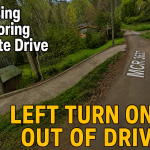 #image_title Thumbnail of a curved road with bold yellow text 'LEFT TURN ONLY OUT OF DRIVE' and white caption 'Exit Using Neighboring Concrete Drive' across a green, wooded area.